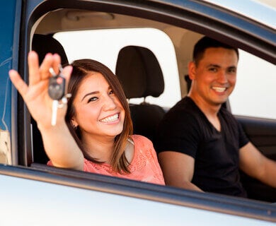 customers in new car holding keys